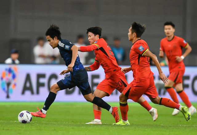 亚洲足坛盛事,日本队喜获胜利 亚洲足坛盛事,日本队喜获胜利